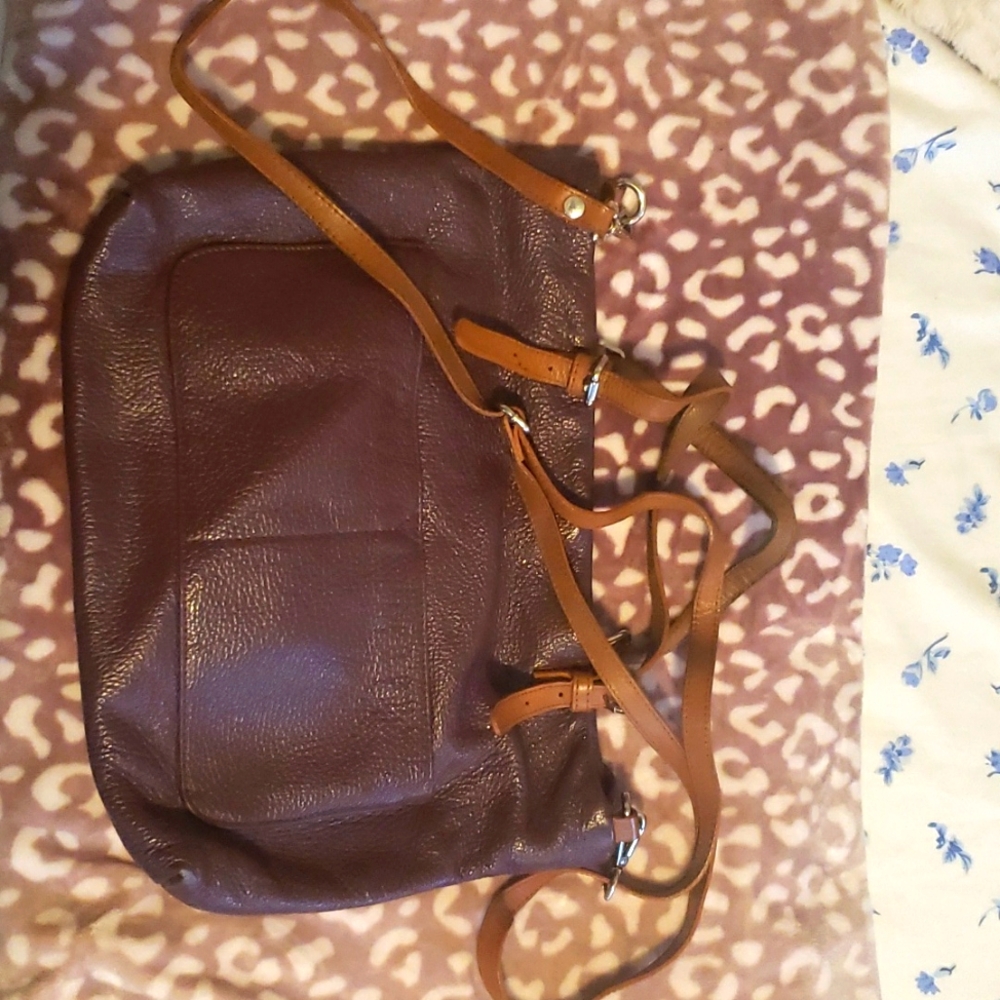 Valentina deep purple  leather bag with brown leather handles and strap.